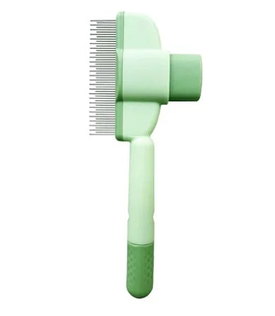 Green pet hair grooming brush with fine metal bristles and ergonomic handle. Designed for removing loose fur and dirt from pets efficiently.