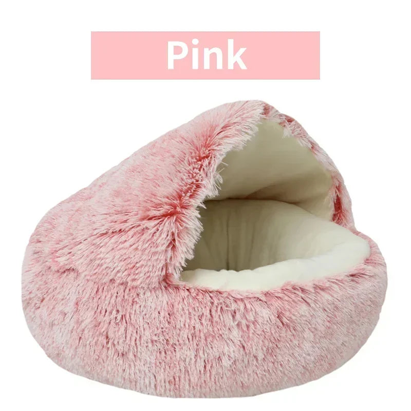 WinterPlus™ Enclosed Pet Cat Bed in pink, designed with plush fabric and a semi-enclosed structure for comfort and warmth.