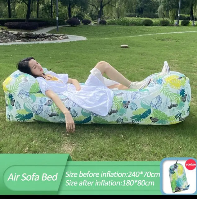 Leaf-patterned Relax™ Inflatable Sofa Bed with size details displayed. Easy to inflate and store, great for outdoor relaxation.